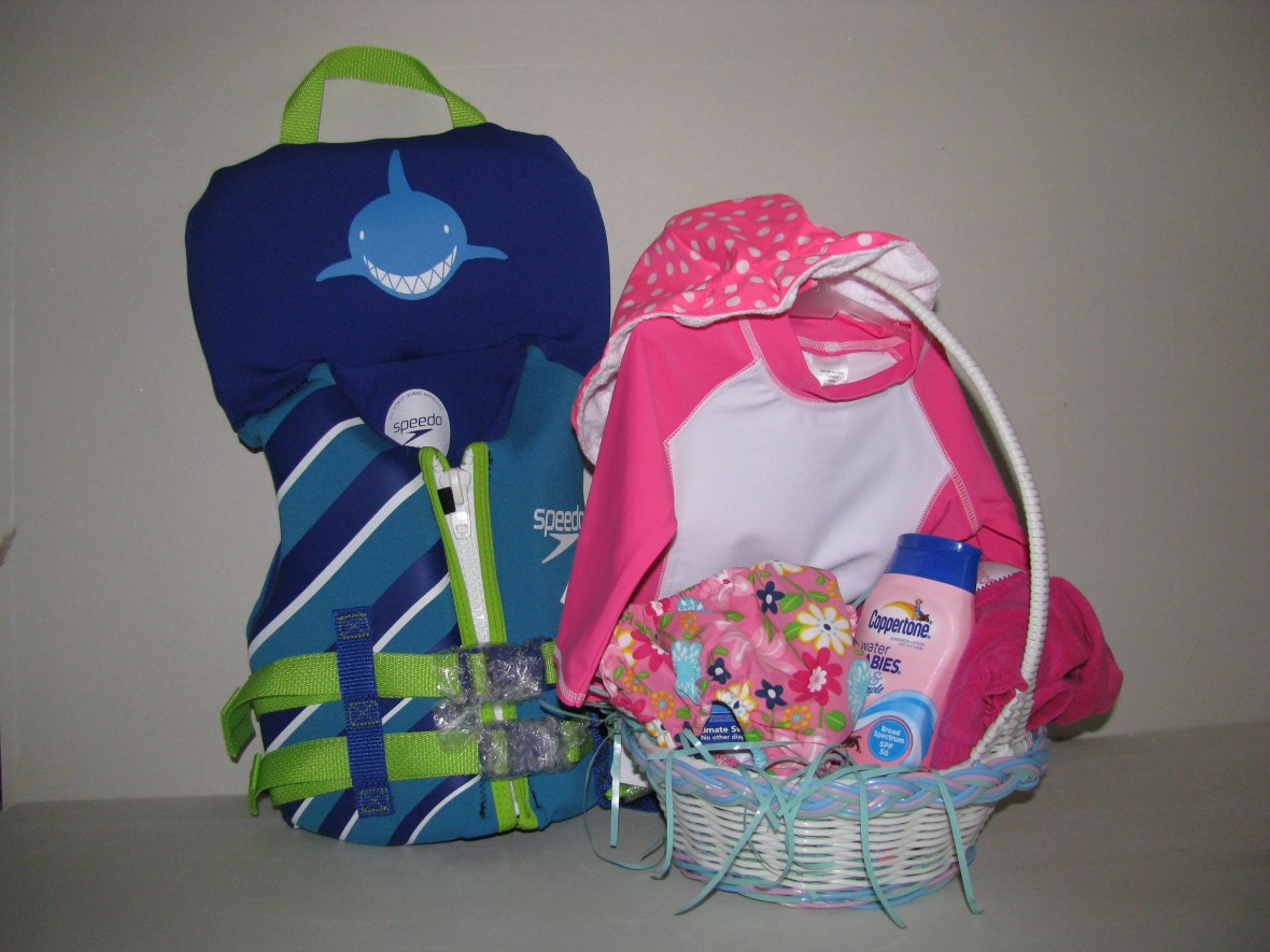 Easter basket: Life jacket, sun bonnet, swim shirt, diaper cover, coverup and baby suntan lotion! All ready for the boat!