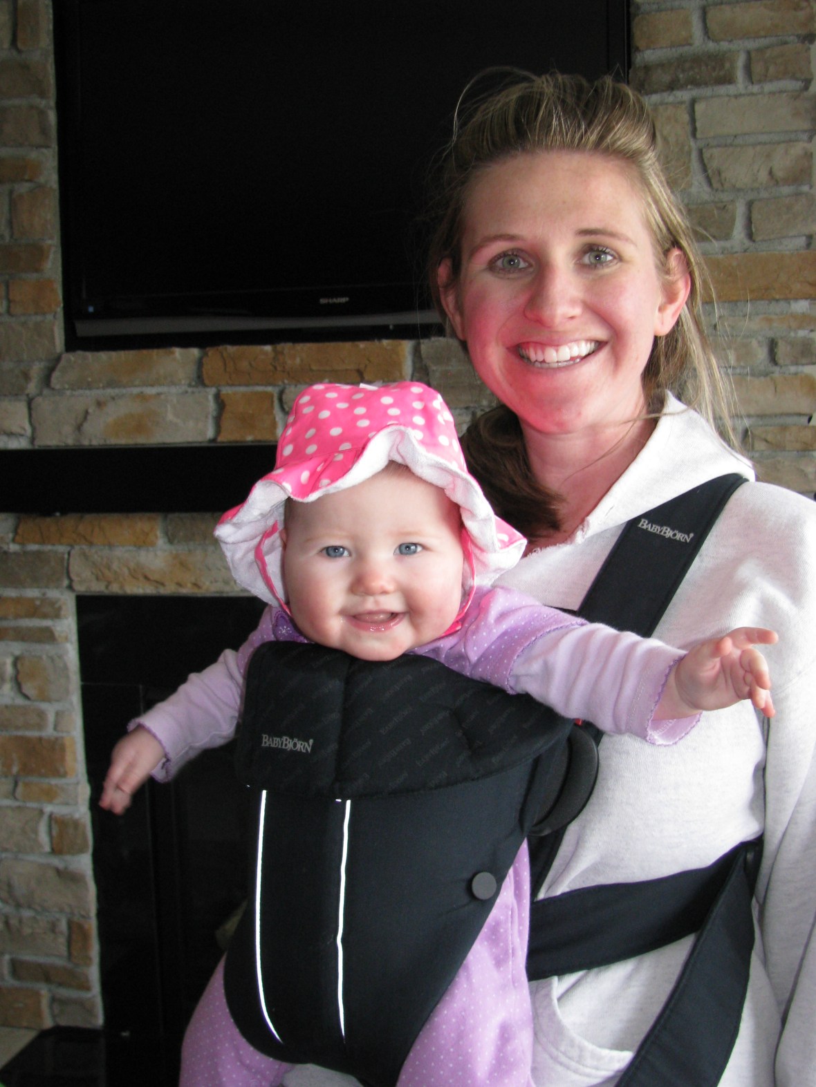 Finally some sunshine and breaking in my new hat while Mom takes down the Christmas lights outside